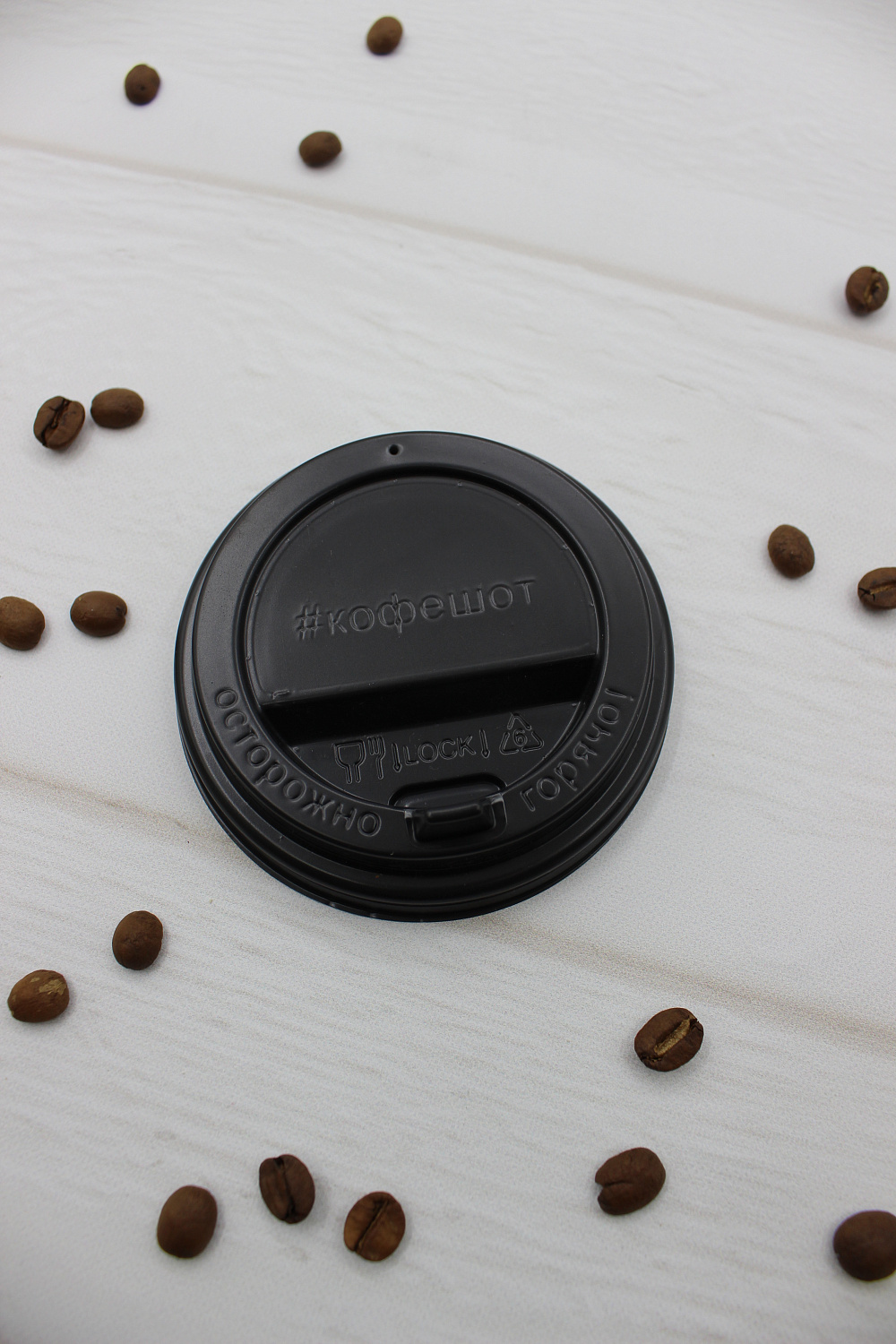 Брендирование крышек для бумажных стаканов  от компании ООО РоссПак